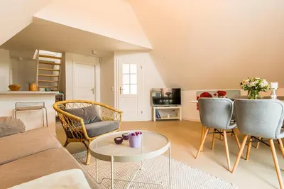 Ein Sitzbereich in der Unterkunft Drei Akazien Wohnung 3