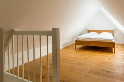 Ein Bett oder Betten in einem Zimmer der Unterkunft Drei Akazien Wohnung 4