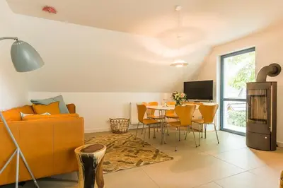 Ein Sitzbereich in der Unterkunft Drei Akazien Wohnung 4
