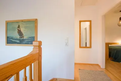 Ein Bett oder Betten in einem Zimmer der Unterkunft Hus Barkenboom