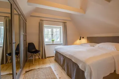 Ein Bett oder Betten in einem Zimmer der Unterkunft Strandhaus Luv