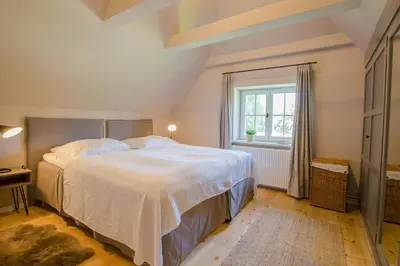 Ein Bett oder Betten in einem Zimmer der Unterkunft Strandhaus Luv