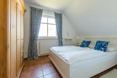 Ein Bett oder Betten in einem Zimmer der Unterkunft Wiesenidyll