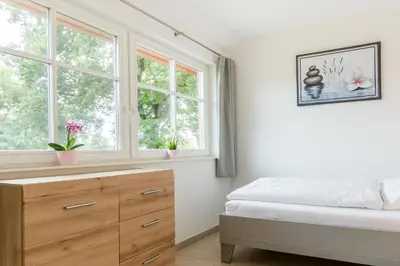 Ein Bett oder Betten in einem Zimmer der Unterkunft An den Eichen 2