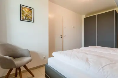 Ein Bett oder Betten in einem Zimmer der Unterkunft An den Eichen 2