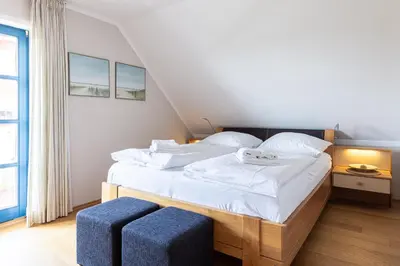 Ein Bett oder Betten in einem Zimmer der Unterkunft Boddenstern
