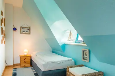 Ein Bett oder Betten in einem Zimmer der Unterkunft Trumhus