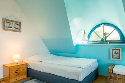 Ein Bett oder Betten in einem Zimmer der Unterkunft Trumhus