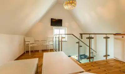 Ein Bett oder Betten in einem Zimmer der Unterkunft Strandrausch