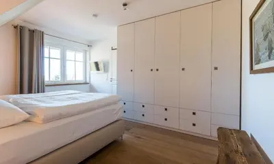 Ein Bett oder Betten in einem Zimmer der Unterkunft Freischwimmer