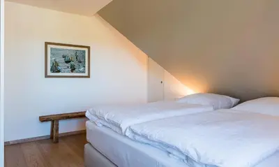 Ein Bett oder Betten in einem Zimmer der Unterkunft Freischwimmer
