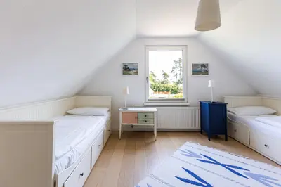 Ein Bett oder Betten in einem Zimmer der Unterkunft An der Rehwiese