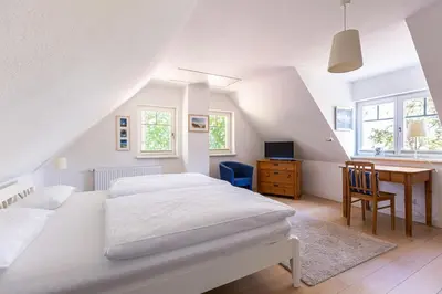 Ein Bett oder Betten in einem Zimmer der Unterkunft An der Rehwiese