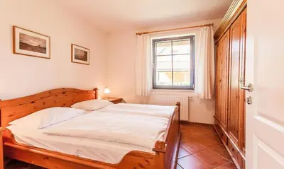 Ein Bett oder Betten in einem Zimmer der Unterkunft Hus in de Wieck 01