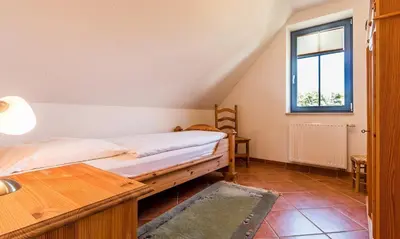 Ein Bett oder Betten in einem Zimmer der Unterkunft Hus in de Wieck 02