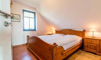 Ein Bett oder Betten in einem Zimmer der Unterkunft Hus in de Wieck 02