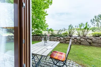 Ein Garten an der Unterkunft Strandhaus Claassen 01