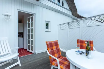 Ein Sitzbereich in der Unterkunft Strandhaus Claassen 07