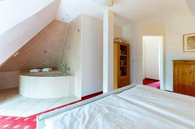 Ein Bett oder Betten in einem Zimmer der Unterkunft Strandhaus Claassen 08