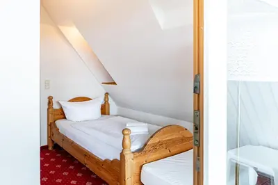 Ein Bett oder Betten in einem Zimmer der Unterkunft Strandhaus Claassen 08
