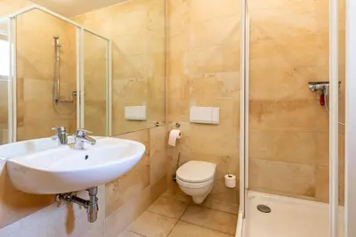 Ein Badezimmer in der Unterkunft Strandhaus Claassen 10