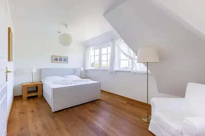 Ein Bett oder Betten in einem Zimmer der Unterkunft Strandhaus hinter der Düne