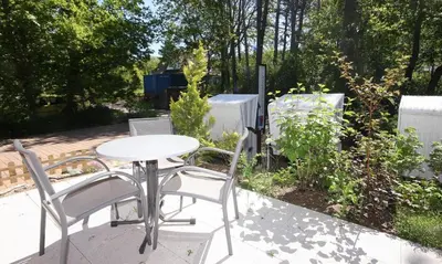 Ein Garten an der Unterkunft Strandleben 03 - Hermann Abeking