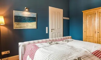 Ein Bett oder Betten in einem Zimmer der Unterkunft Hyggelig Hus