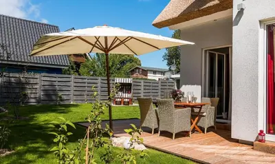 Ein Garten an der Unterkunft Hyggelig Hus