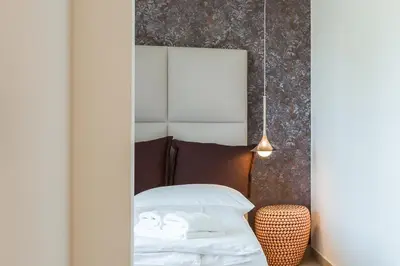 Ein Bett oder Betten in einem Zimmer der Unterkunft Pur A2