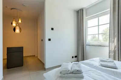 Ein Bett oder Betten in einem Zimmer der Unterkunft Pur A2