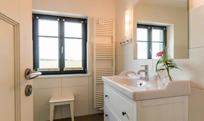 Ein Badezimmer in der Unterkunft Alte Räucherei 02