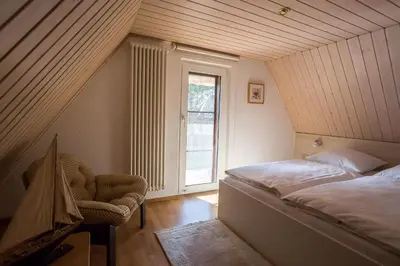 Ein Bett oder Betten in einem Zimmer der Unterkunft Tilda