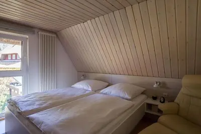 Ein Bett oder Betten in einem Zimmer der Unterkunft Tilda