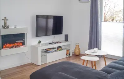 TV/Unterhaltungsangebot in der Unterkunft Ferienwohnung Mit Hafenblick