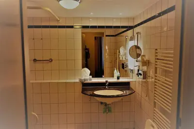 Ein Badezimmer in der Unterkunft Am Kurhaus 410, Villa Kurpark PP 89