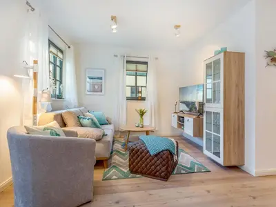 Ein Sitzbereich in der Unterkunft Haus Sommerwiese