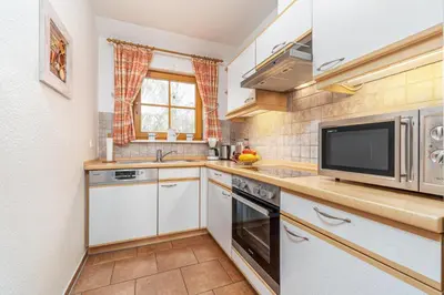 Küche/Küchenzeile in der Unterkunft Ferienpark Freesenbruch Wohnung 3 4 - Zum Zeesenboot