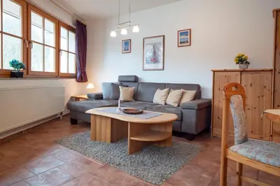 Ein Sitzbereich in der Unterkunft Ferienpark Freesenbruch Wohnung 13a - Austernfischer