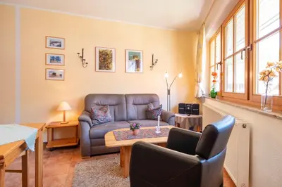 Ein Sitzbereich in der Unterkunft Ferienpark Freesenbruch Wohnung 13b - Haubentaucher