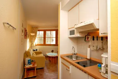 Küche/Küchenzeile in der Unterkunft Ferienpark Freesenbruch Wohnung 13b - Haubentaucher