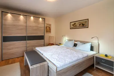 Ein Bett oder Betten in einem Zimmer der Unterkunft Ferienpark Freesenbruch Wohnung 4 1 - Boddenkiker