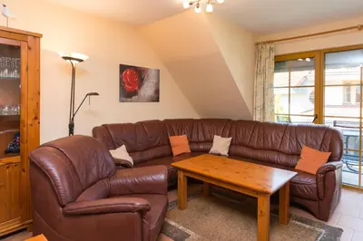 Ein Sitzbereich in der Unterkunft Ferienpark Freesenbruch Wohnung 1 6 - Freesenblick