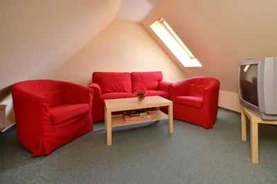 Ein Sitzbereich in der Unterkunft Ferienpark Freesenbruch Wohnung 1 6 - Freesenblick