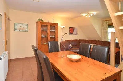 Ein Sitzbereich in der Unterkunft Ferienpark Freesenbruch Wohnung 1 6 - Freesenblick