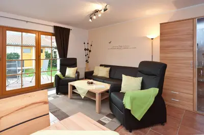 Ein Sitzbereich in der Unterkunft Ferienpark Freesenbruch Wohnung 4 2 - Ostseeperle