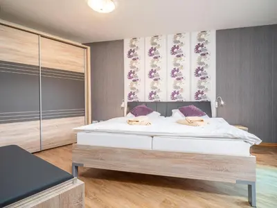 Ein Bett oder Betten in einem Zimmer der Unterkunft Ferienpark Freesenbruch Wohnung 2 1 - Möwennest
