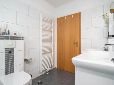 Ein Badezimmer in der Unterkunft Ferienpark Freesenbruch Wohnung 2 1 - Möwennest