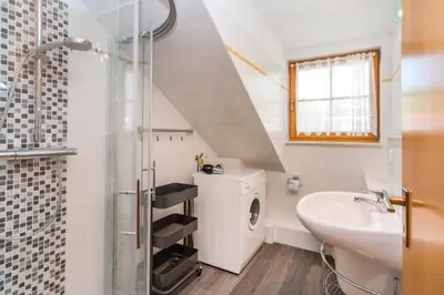 Ein Badezimmer in der Unterkunft Ferienpark Freesenbruch Reihenhaus 7 - Seestern