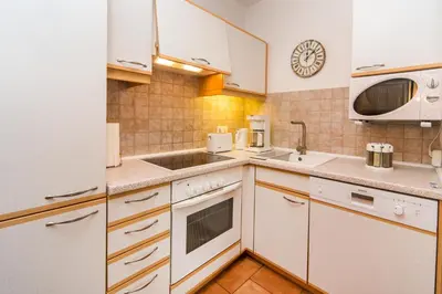Küche/Küchenzeile in der Unterkunft Ferienpark Freesenbruch Wohnung 3 2 - Kranichrast